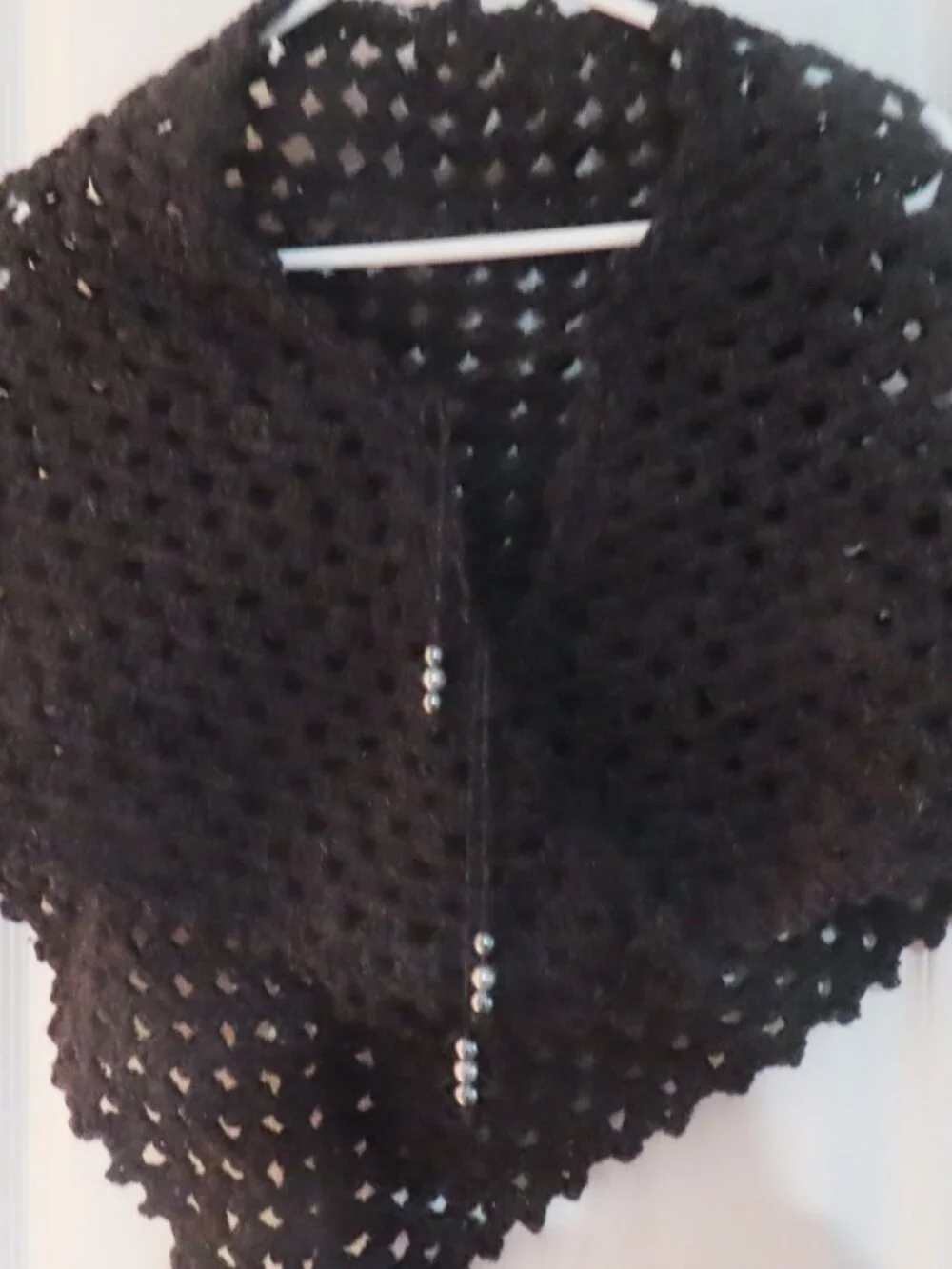 Hand crocheted black wool shawl